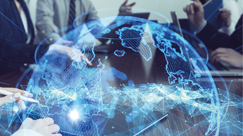 The role of the guarantee bank A group of professionals is engaged in a discussion around a table, with a digital globe overlay showcasing interconnected data networks. The image conveys themes of collaboration, technology, and global communication in a modern business setting.